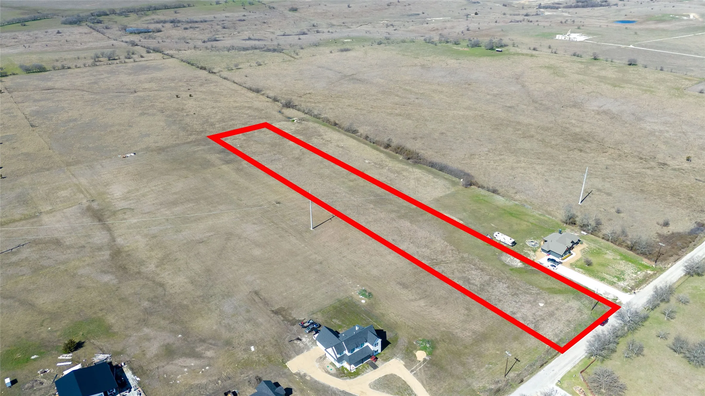 Overview of rural landscape featuring property parcel outlined