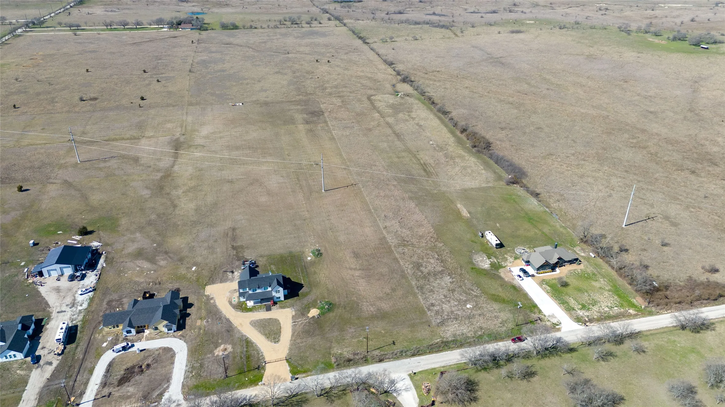 Aerial view of property's location featuring rural landscape