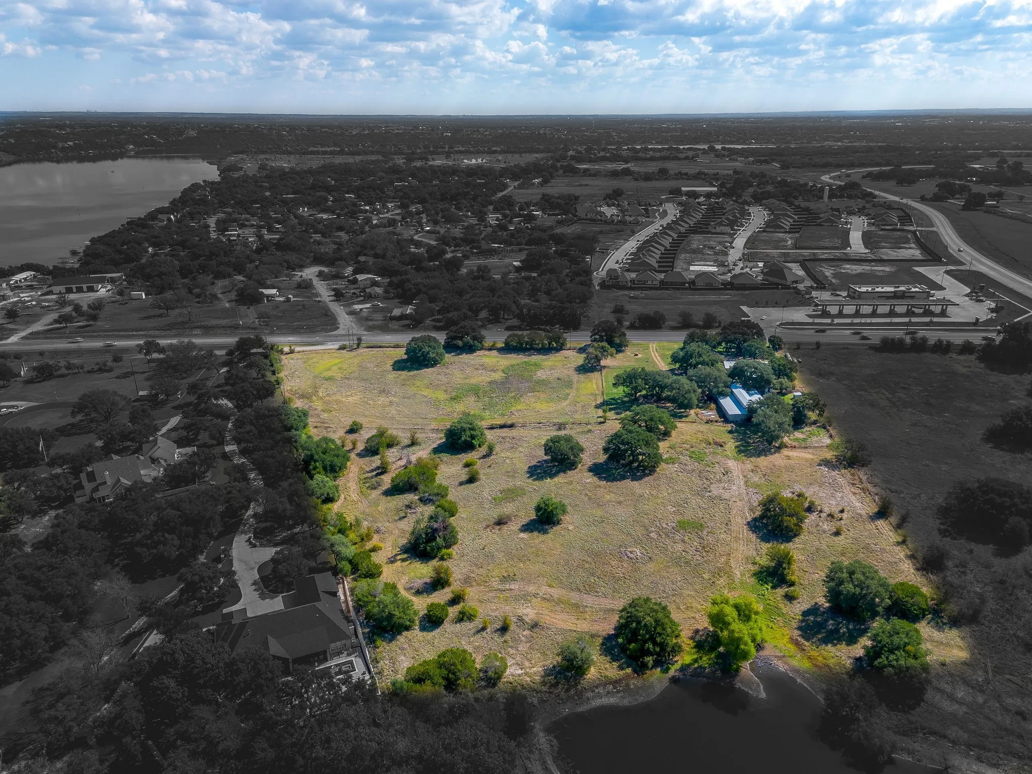 Aerial overview of property's location featuring a nearby body of water
