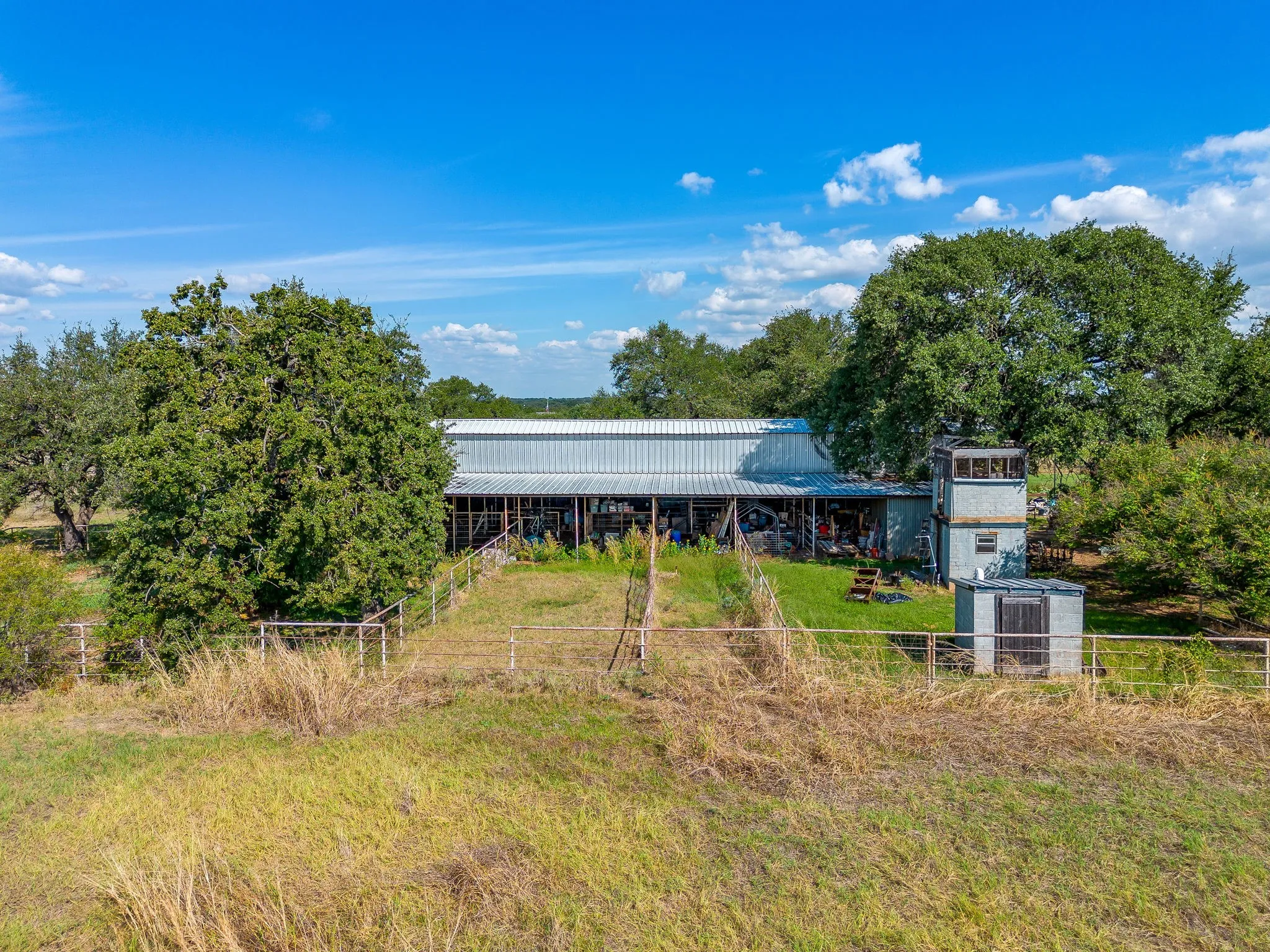 View of yard with an outdoor structure and an outbuilding