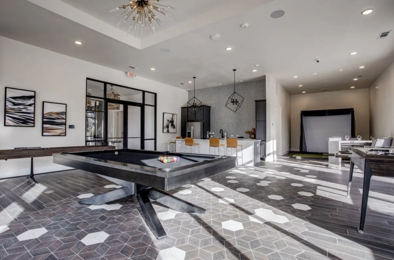 Game room with pool table, golf simulator and more