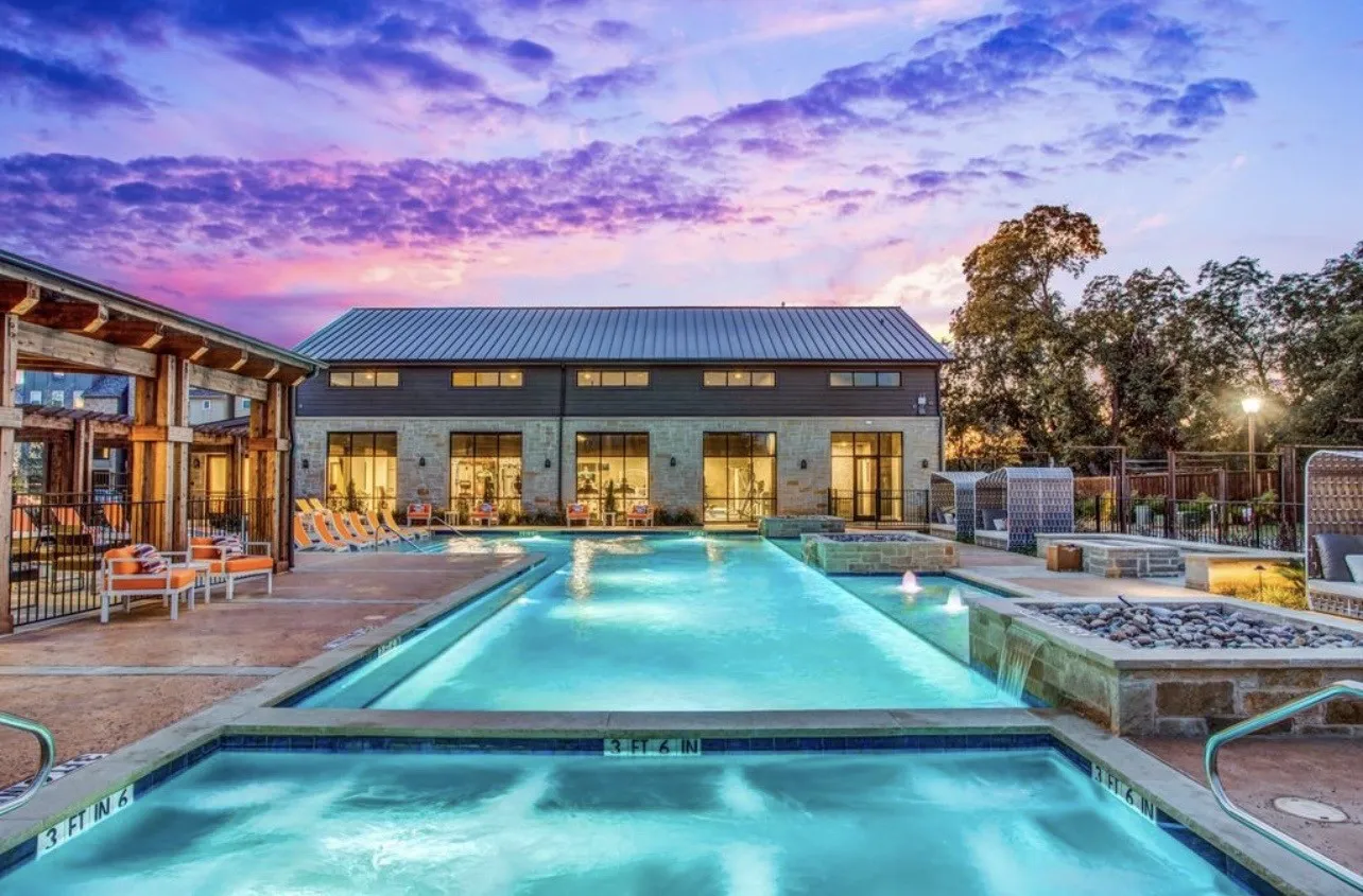 Community pool steps away from home with pool, spa, tanning ledge, and patio