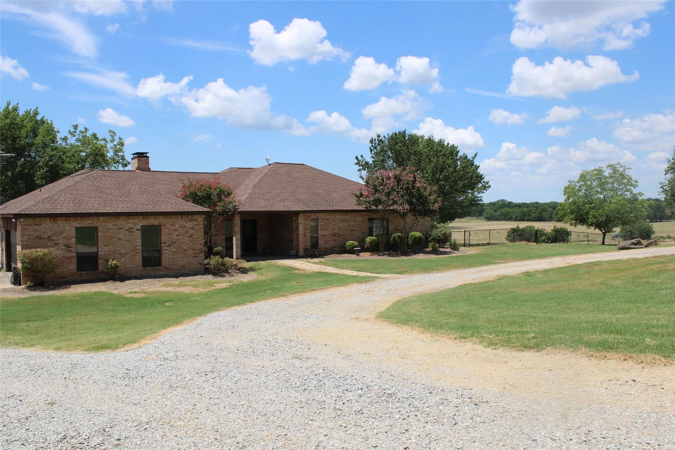 Single story home with a front yard