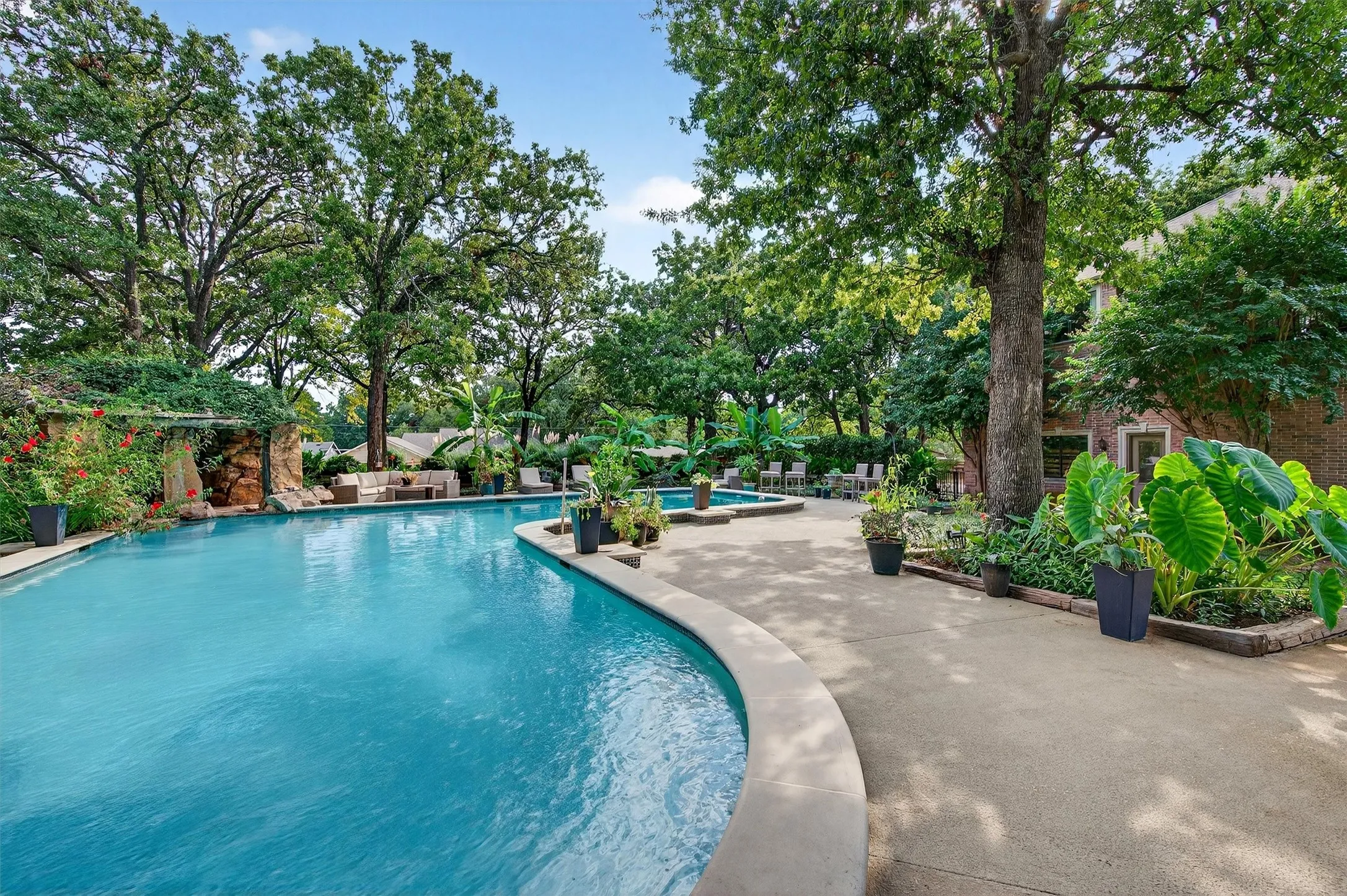 Large Pool with Beautiful Lush Landscaping