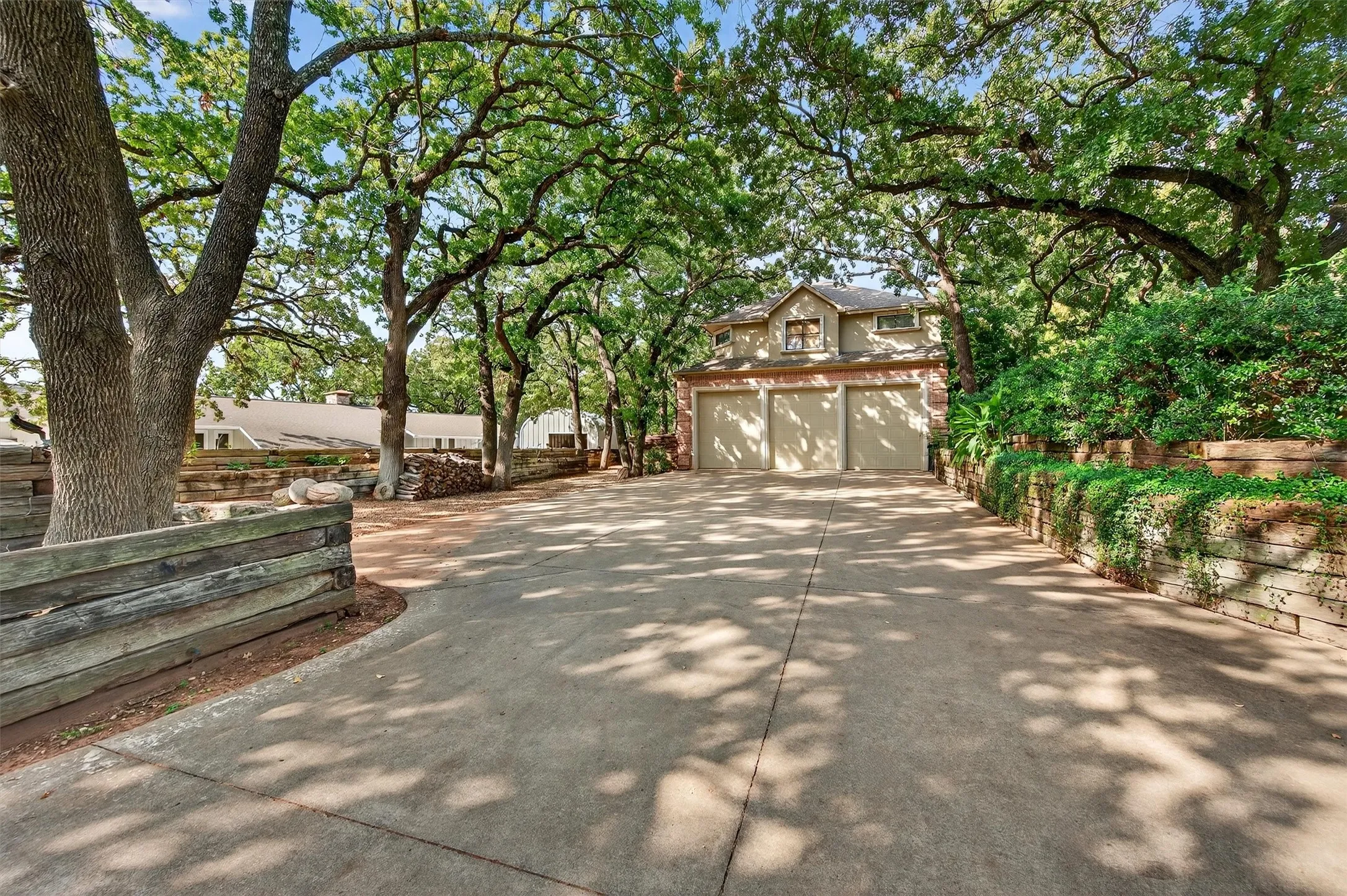 2nd Driveway Leading to Detached Garage and Guest Quarters