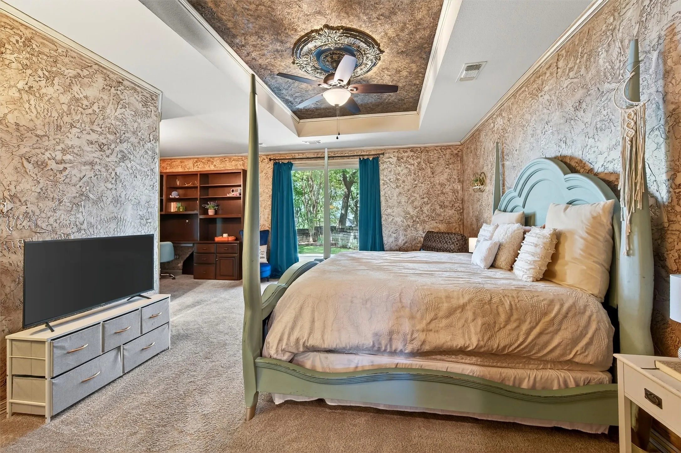 Secondary Bedroom with French Doors to West facing Deck Space and built in Desk Area