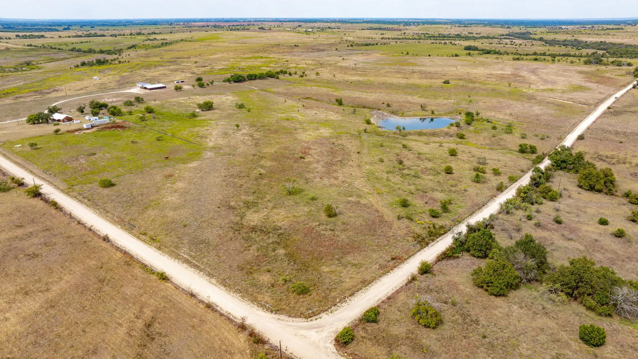 View of property location featuring rural landscape and a nearby body of water