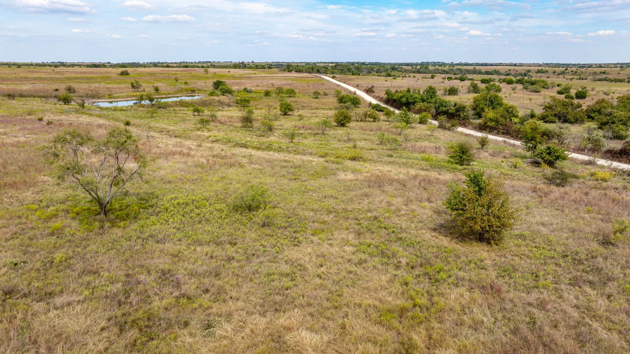 View of rural area featuring a nearby body of water