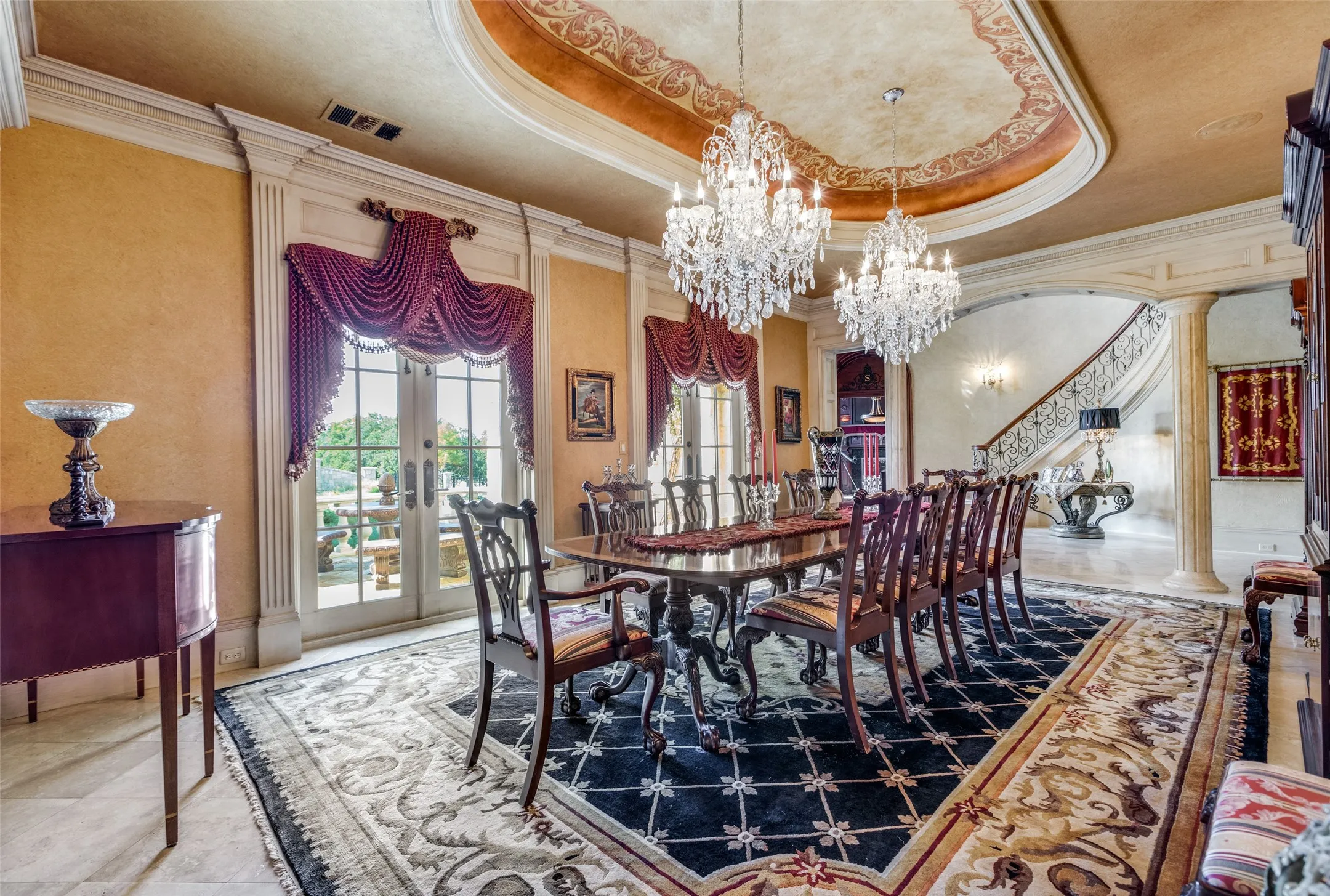 Formal Dining with French Doors and 2 Chandeliers
