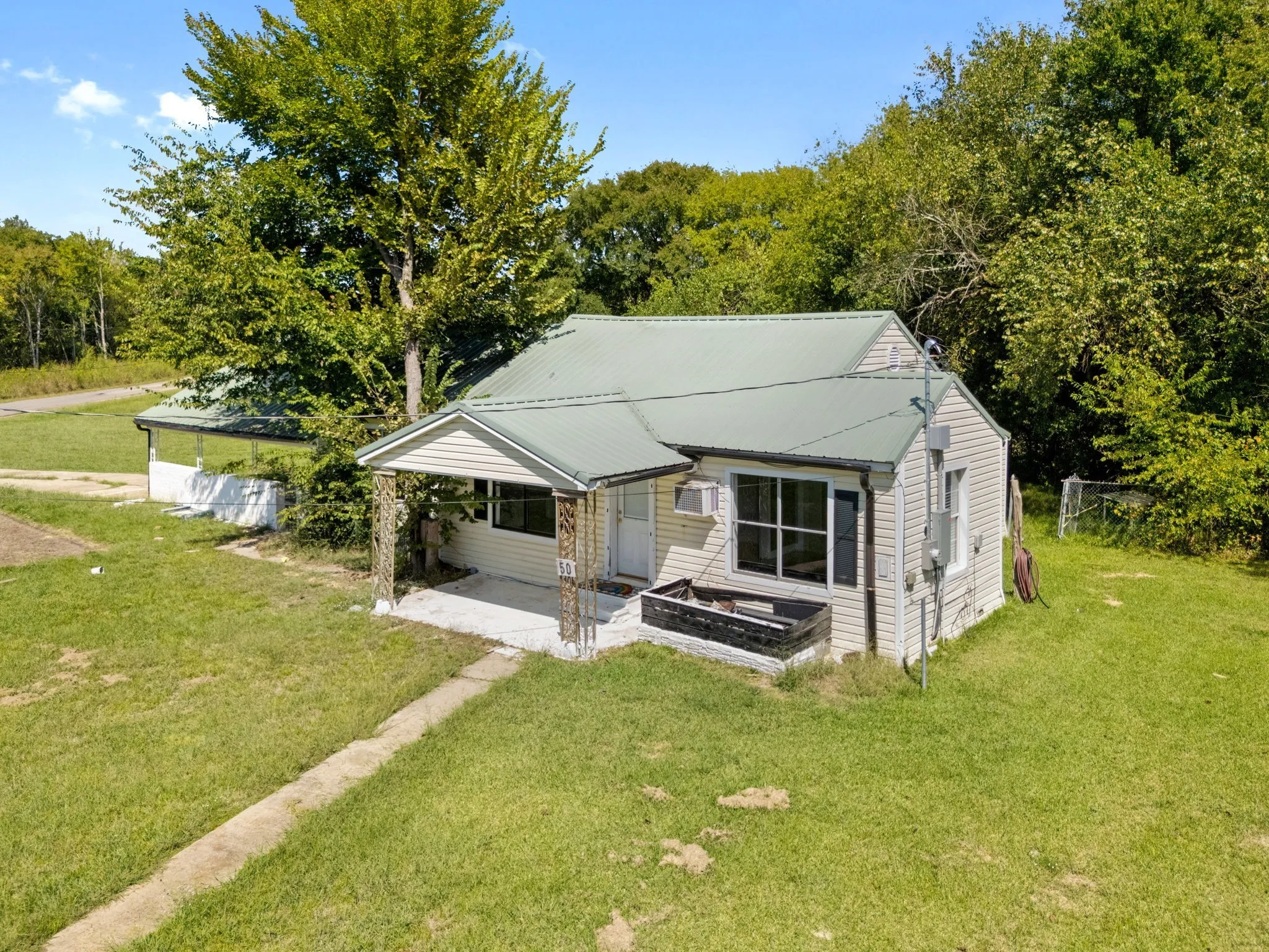 Single Family Residence For Sale in Red River (TX) County , 50 County Road 2123, Clarksville, Texas 75426, 2 Bedrooms, 1 Bathroom, Garage spaces, 1,248 Sqft, built in 1946, Price $110,000, mls#21063284, Real Estate Agent in Clarksville, Homes For Sale in Red River (TX) county, Homes For Sale in Clarksville, Realtor in Clarksville Texas, Real Estate Brokerage Independent Realty Texas, Luminita Cordes Realtor