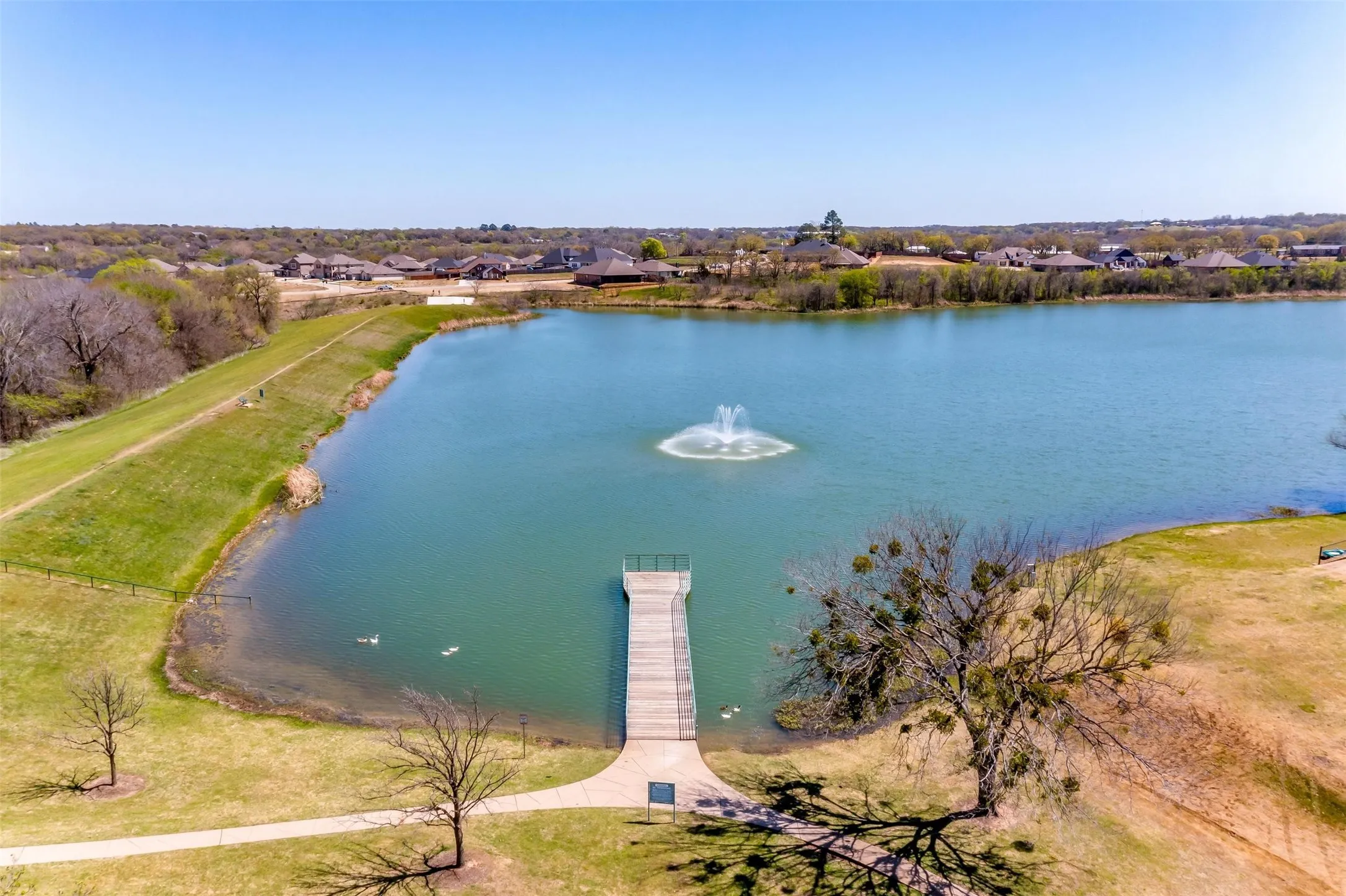 Aerial view of residential area with a large body of water