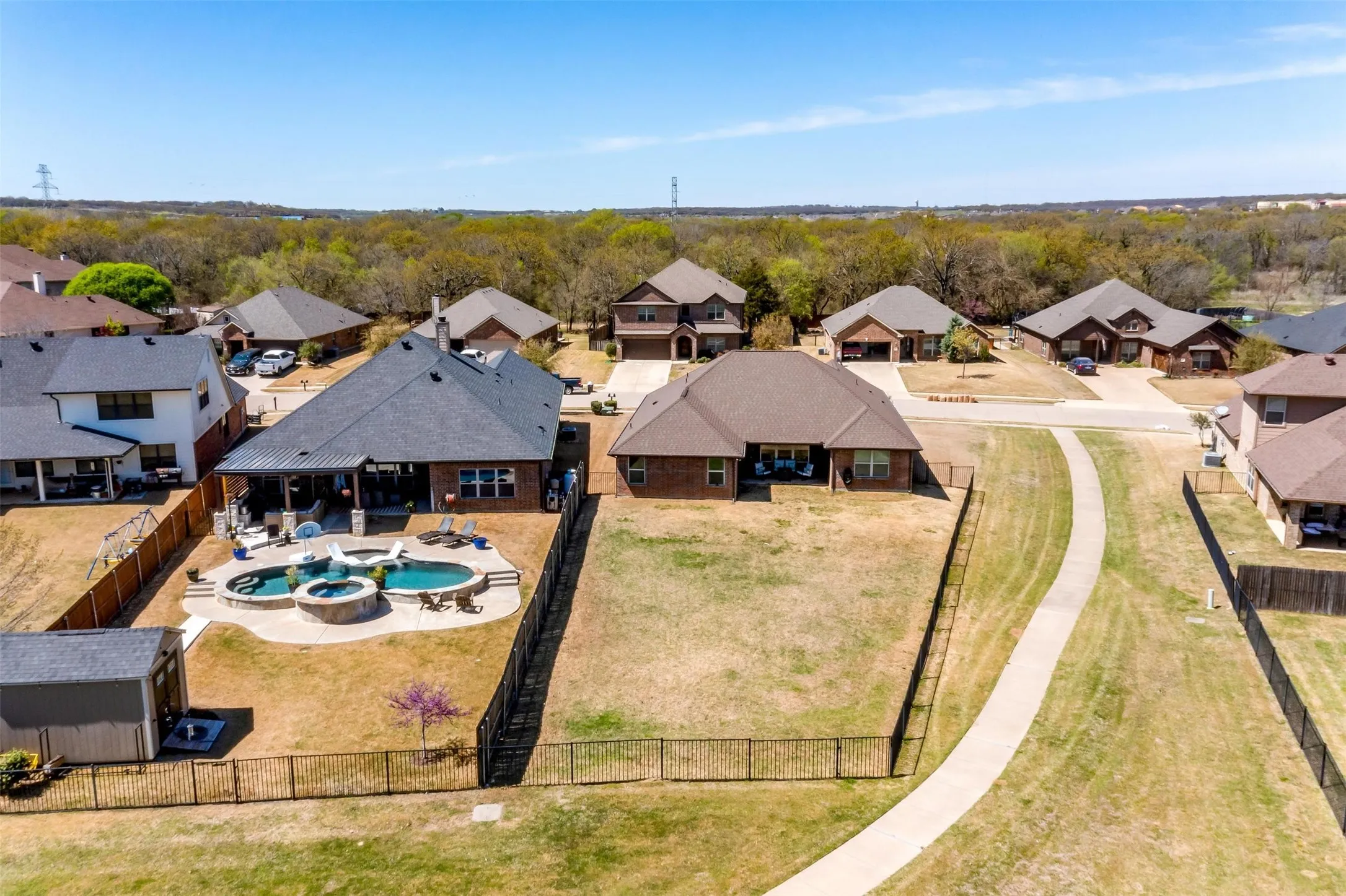 Aerial view of residential area with a pool area