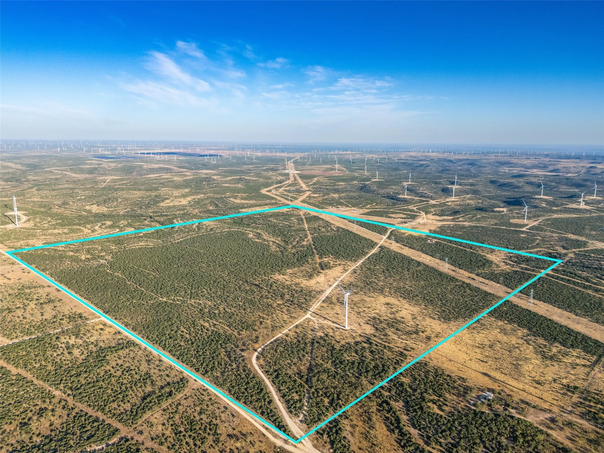Overview of rural landscape with property parcel outlined