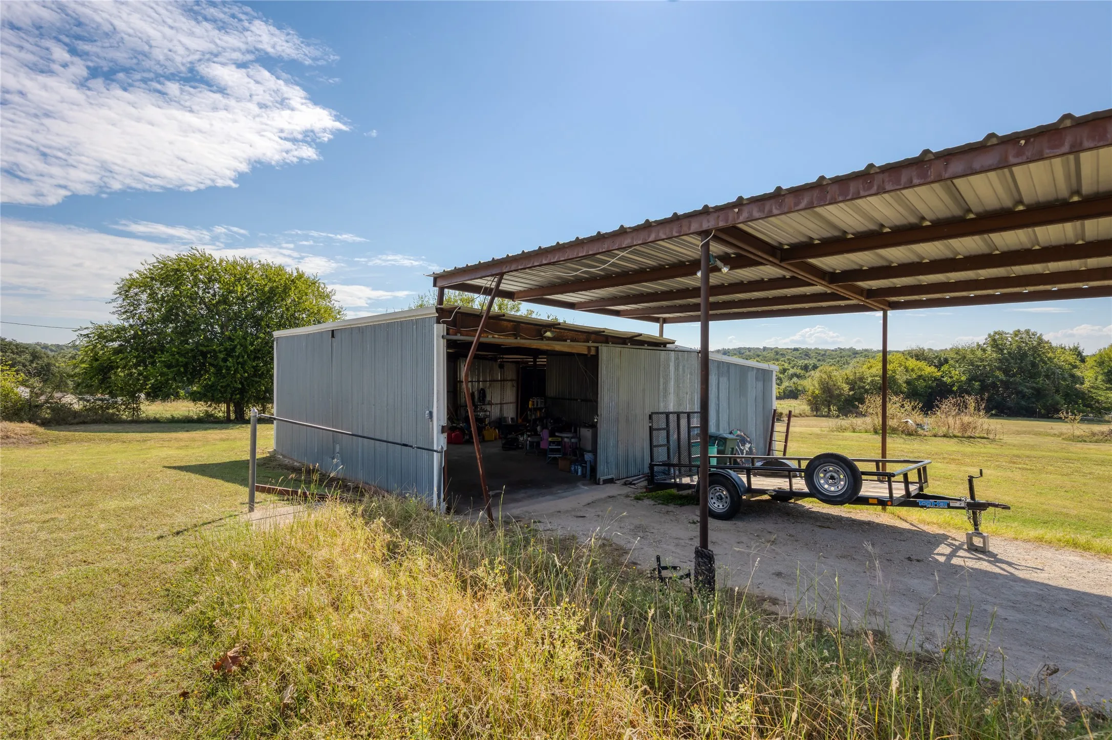 View of workshop and  carport
