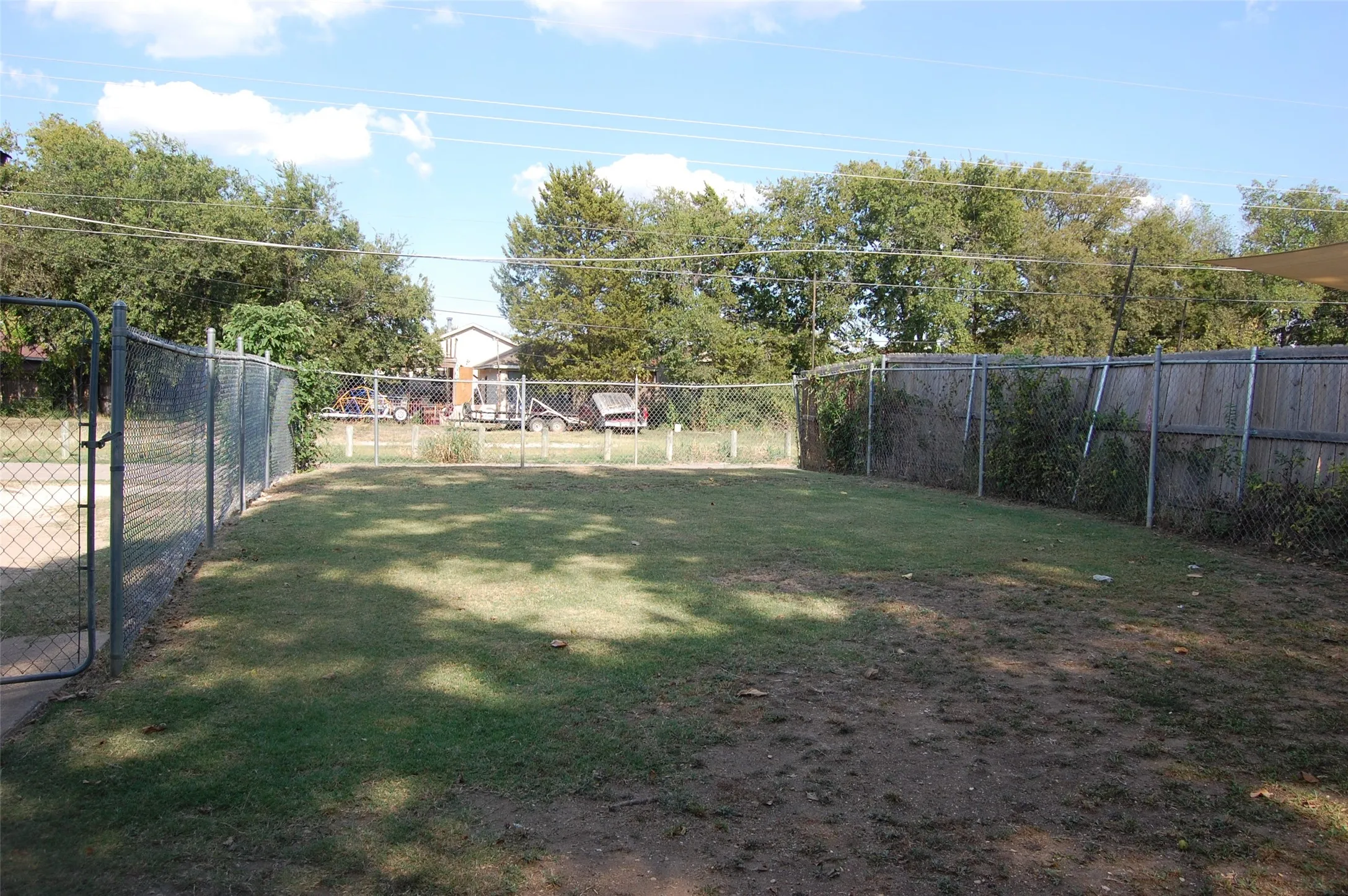 View of Spacious Fenced Back yard
