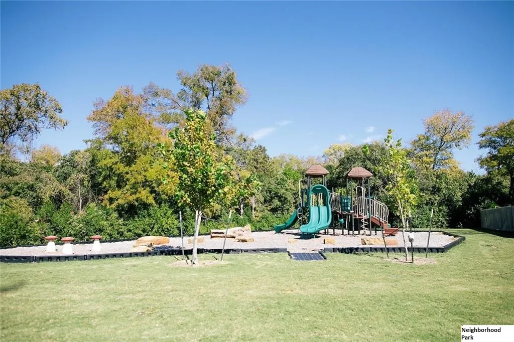 Community play area with a lawn
