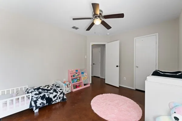 Playroom with a ceiling fan