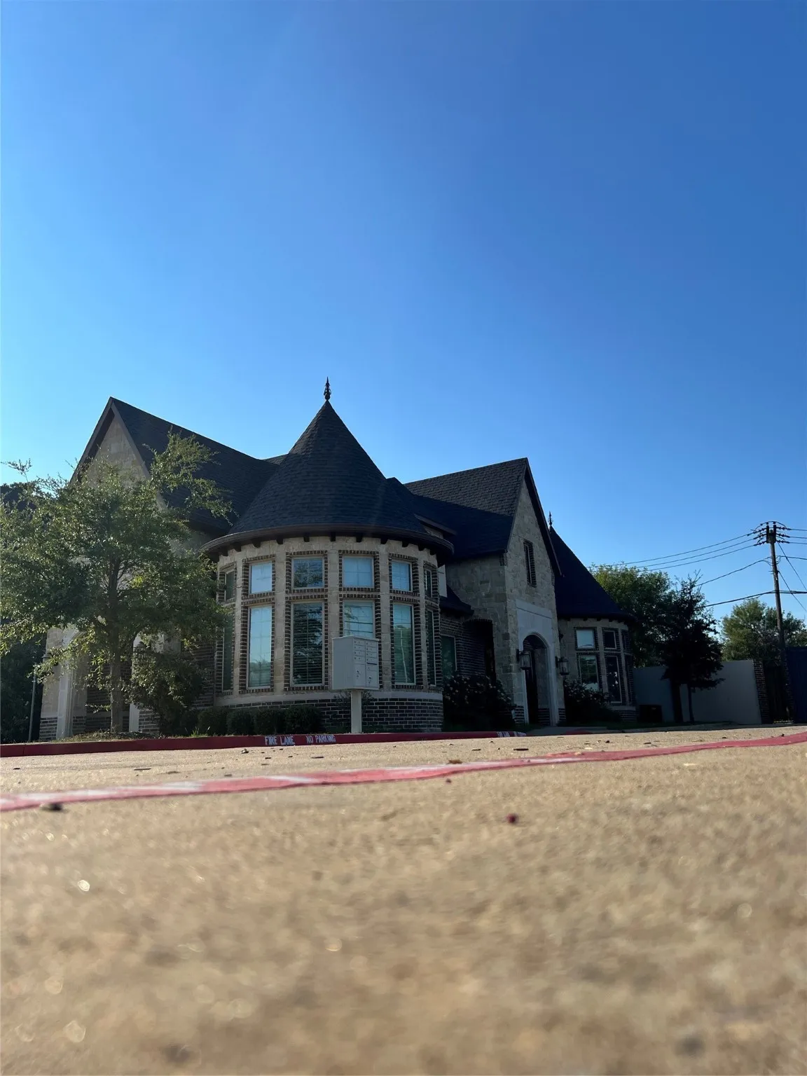 View of front of house with stone siding