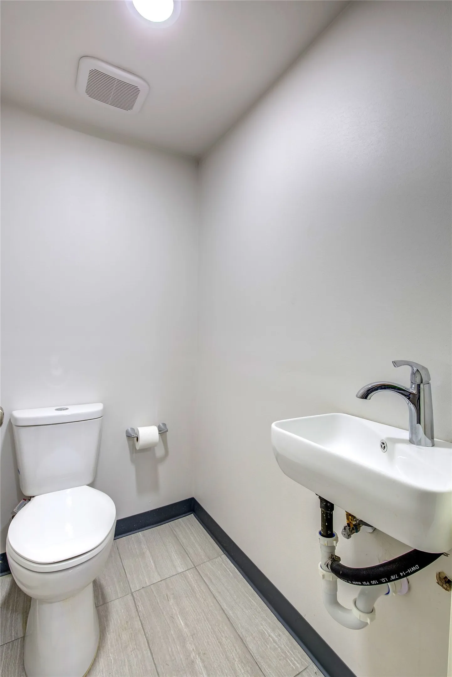 Half bath in office area.