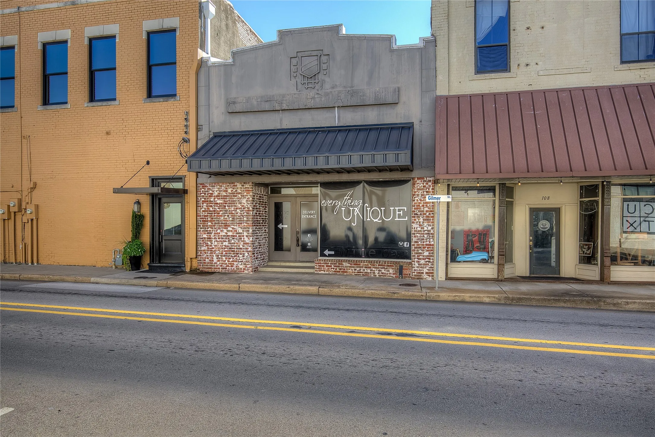 The second of three entrances, on the side street, could be used as a second retail entrance.