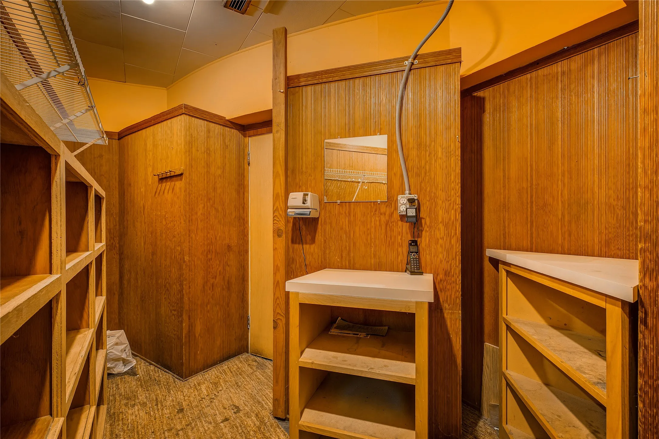 Storage room hidden behind bar