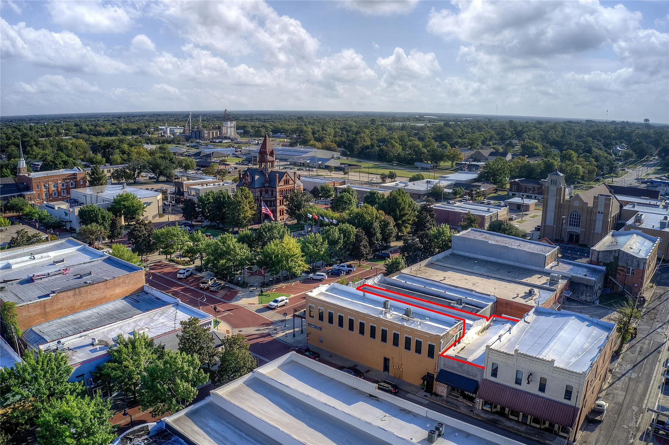 Bird's eye view. Store is to the right, marked in red. Square has live events and lots of shopping and restaurants.