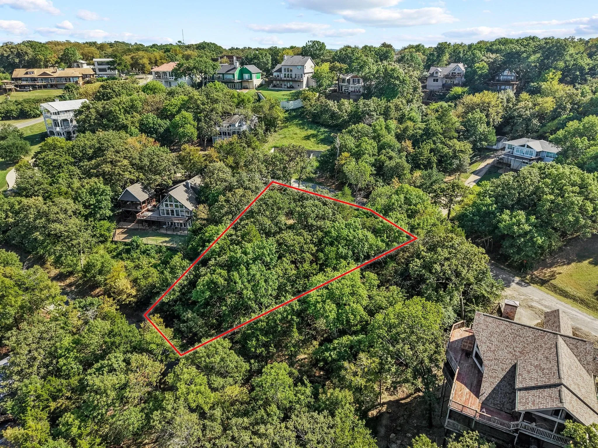 Aerial view of property's location featuring property parcel outlined