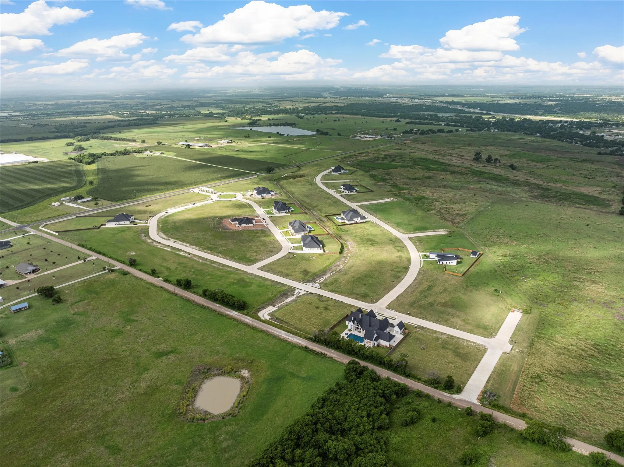Aerial overview of property's location with rural landscape