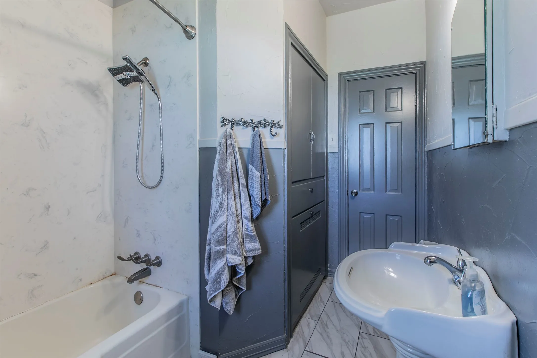Full bath featuring  shower combination