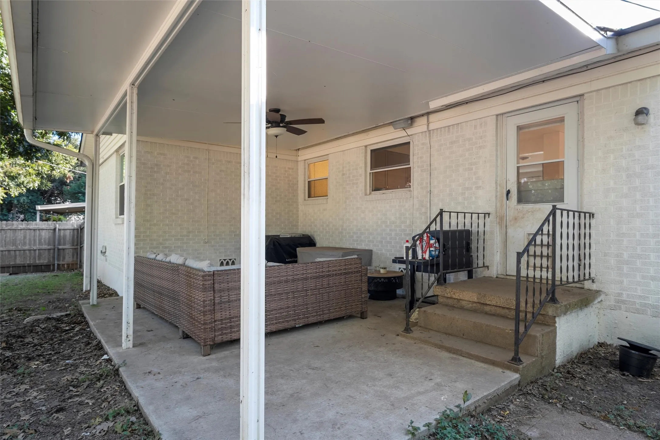 View of patio / terrace with a ceiling fan and an outdoor hangout area