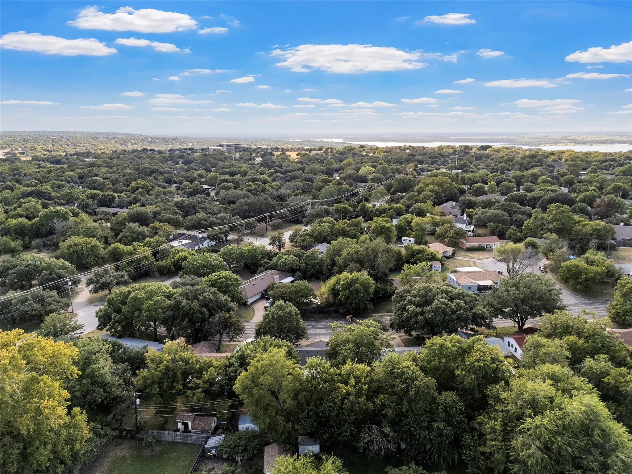 Drone / aerial view of a tree filled landscape