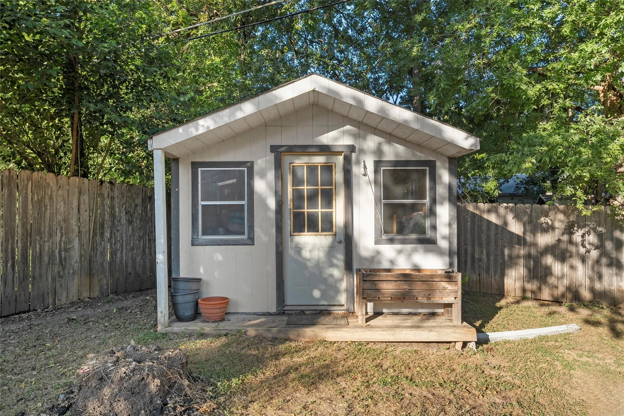 View of outbuilding featuring a fenced backyard