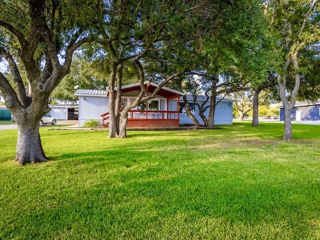 Big Grassy Yards for Lawn Games and Lakeside Fun, and Big Oak Shade Trees.