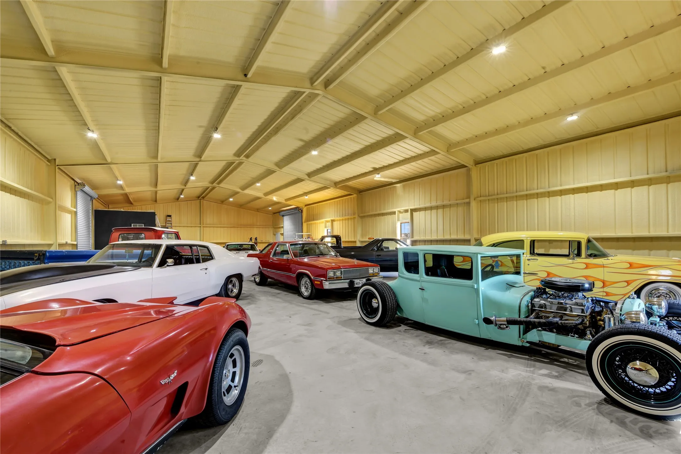Garage featuring metal wall