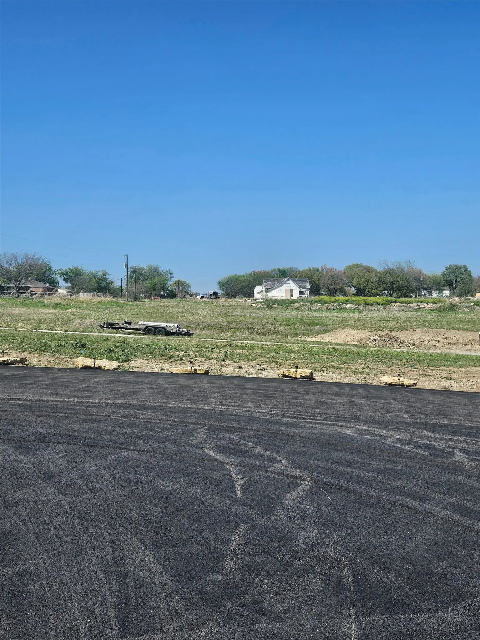 adjacent 2 acres with paved road