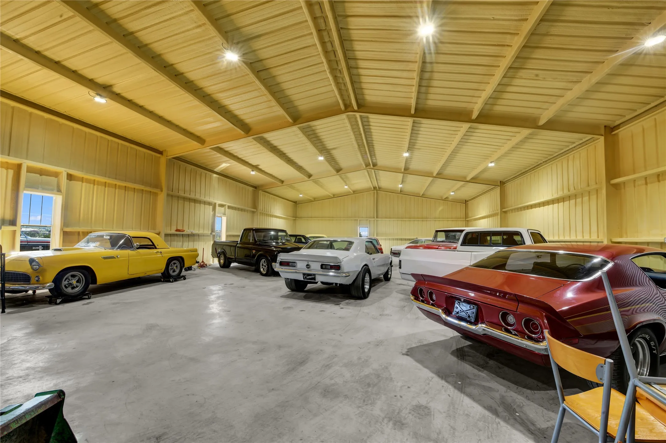 Garage featuring metal wall
