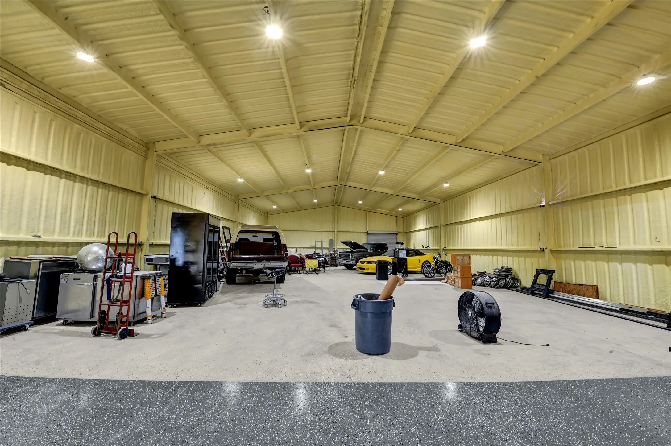 Garage featuring metal wall