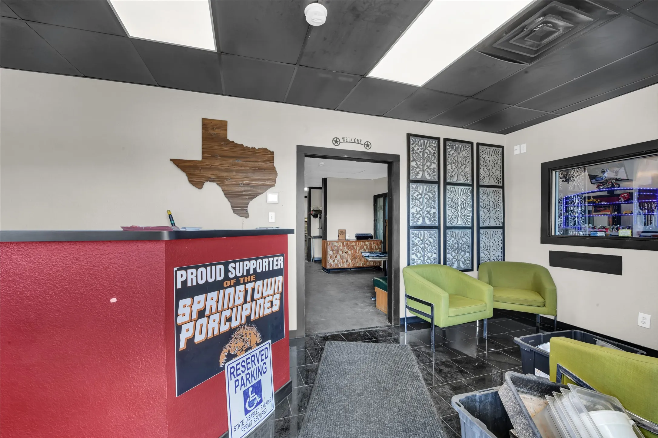 Community lobby featuring a paneled ceiling