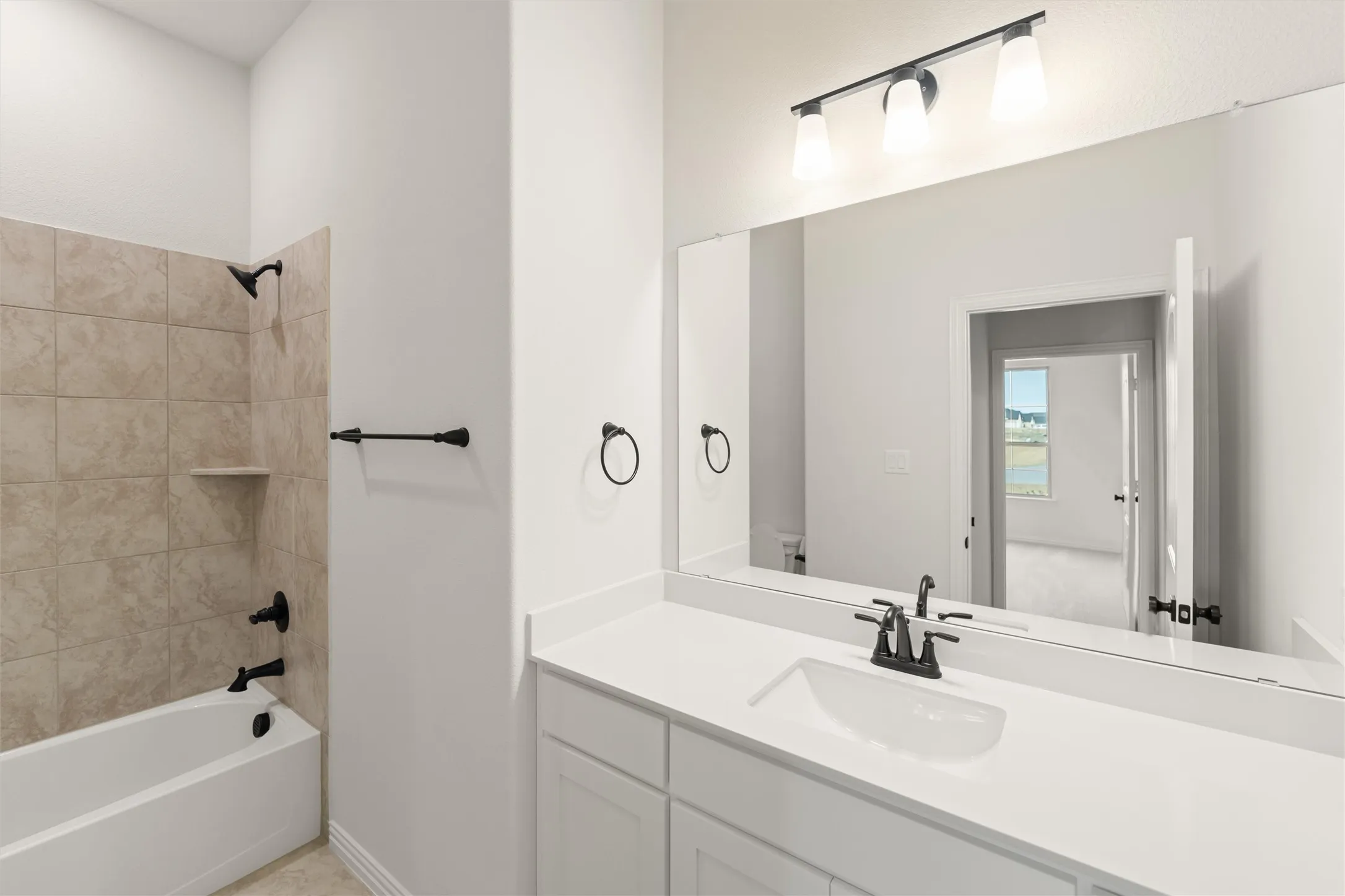 Full bath with tub / shower combination and vanity