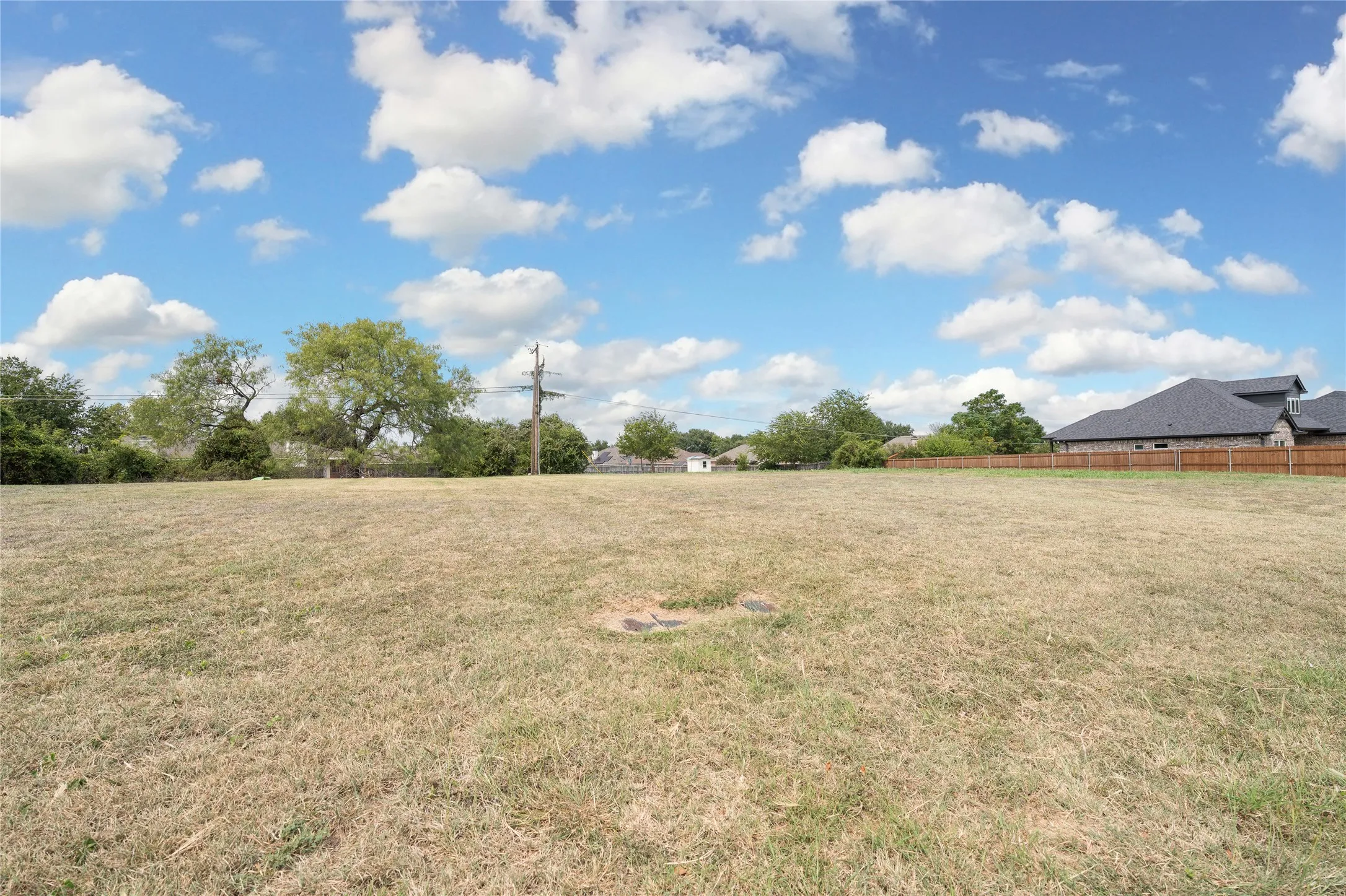 View of yard with a view of rural / pastoral area