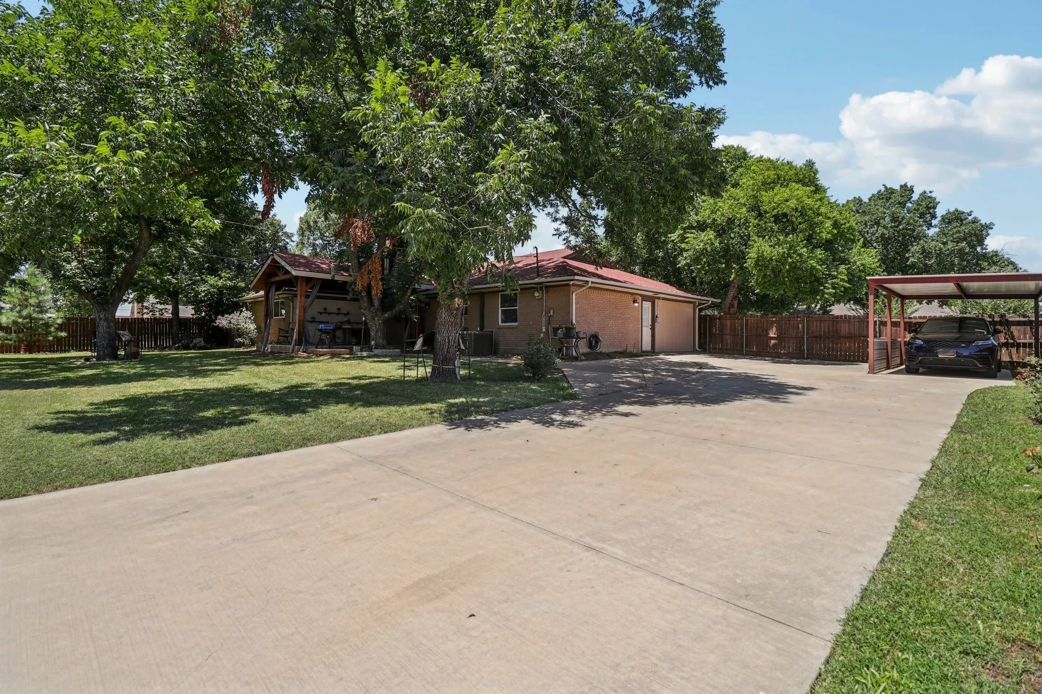 Plenty of space to park up to eight! cars comfortably. What a perfect backyard for entertaining!