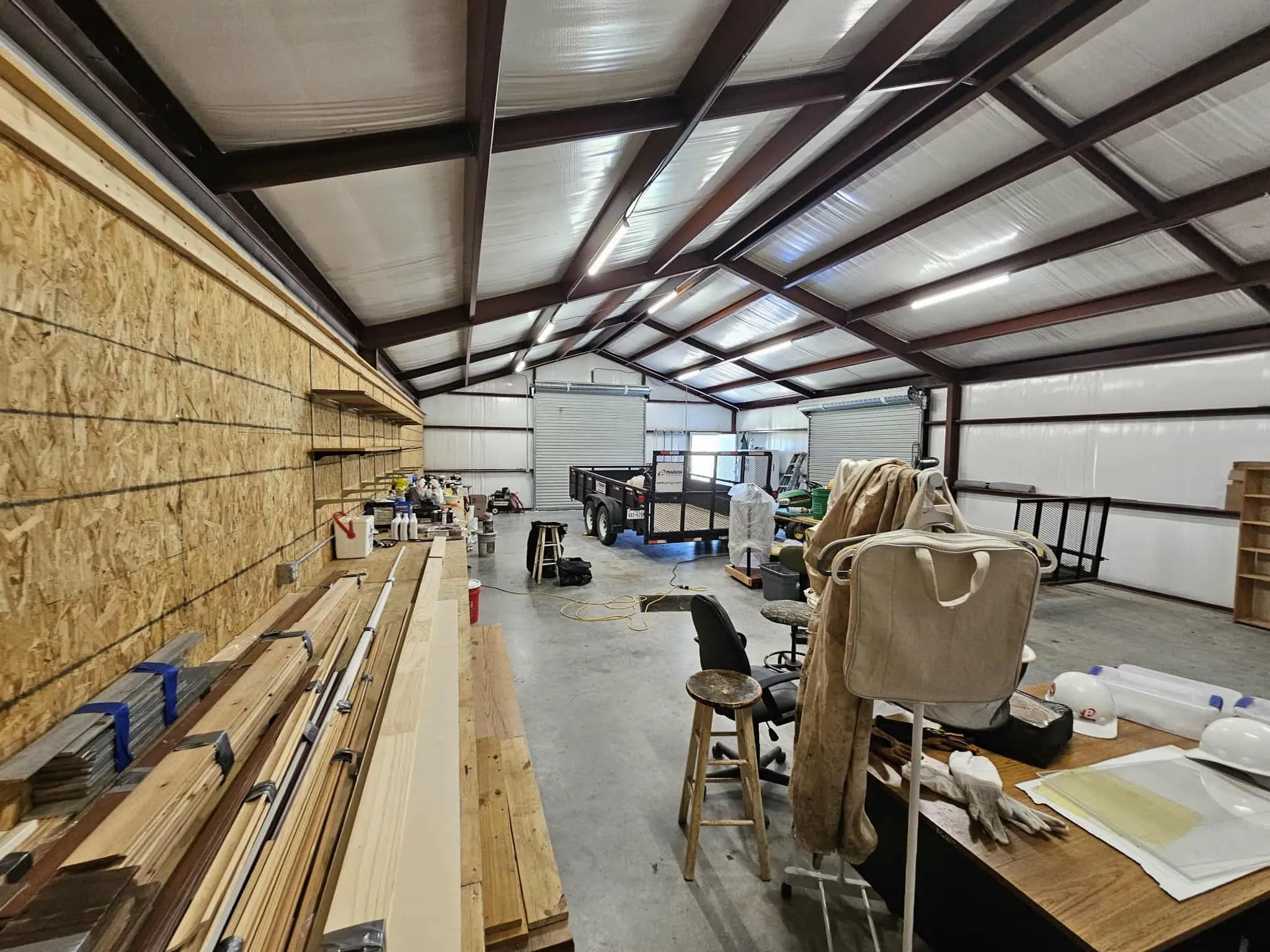 Garage featuring metal wall