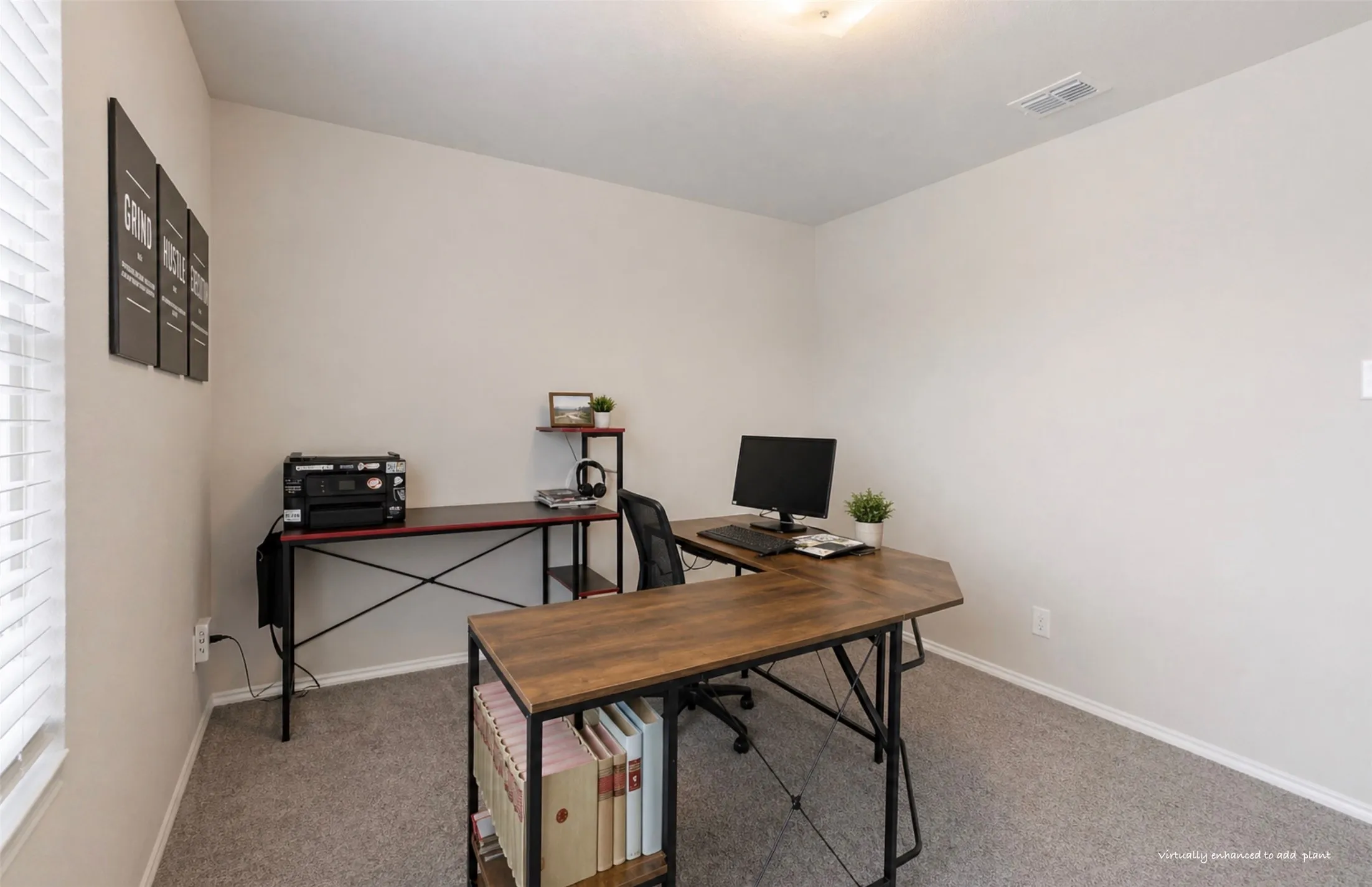 2nd bedroom sett up as an office