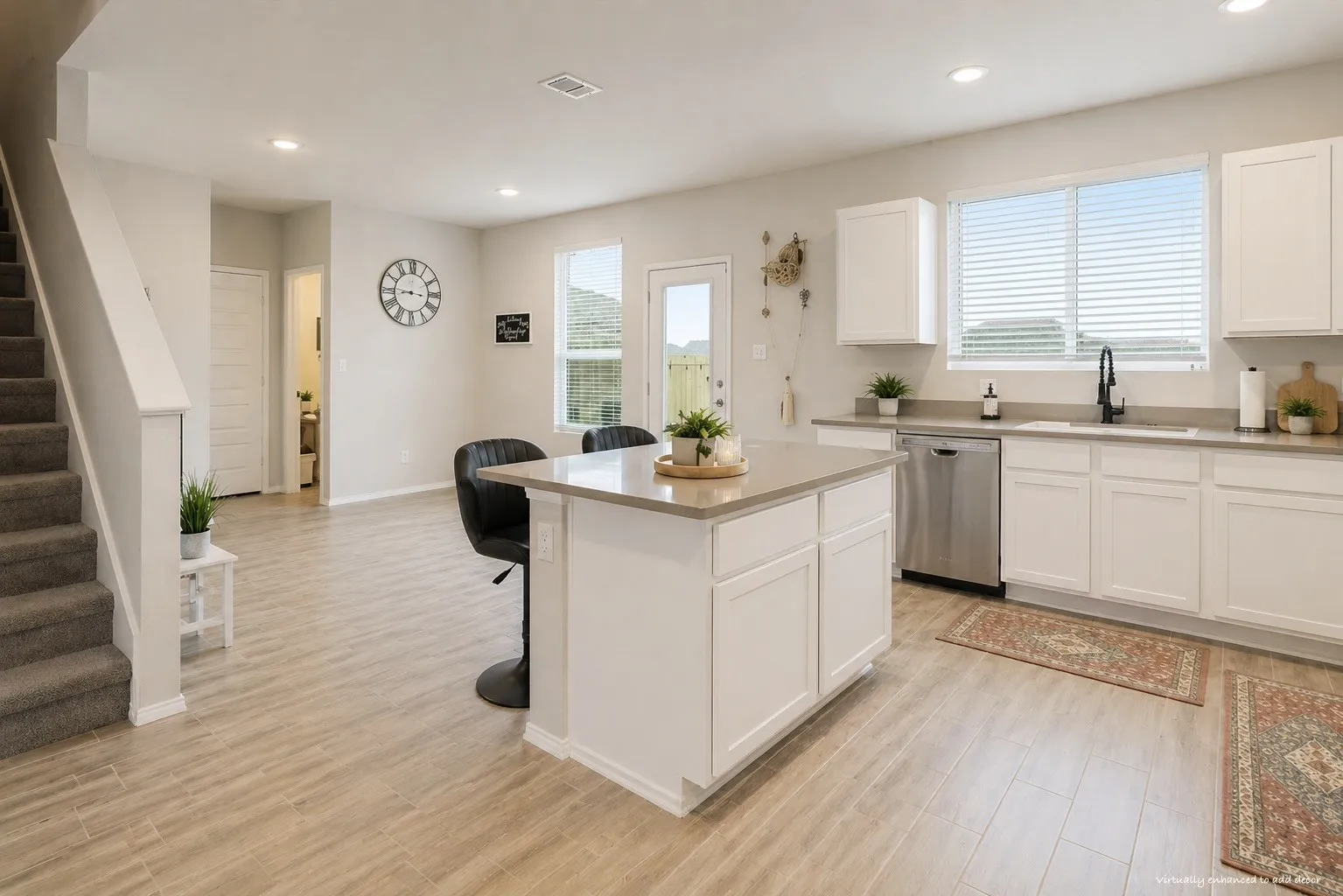 View of kitchen and breakfast area from the living room