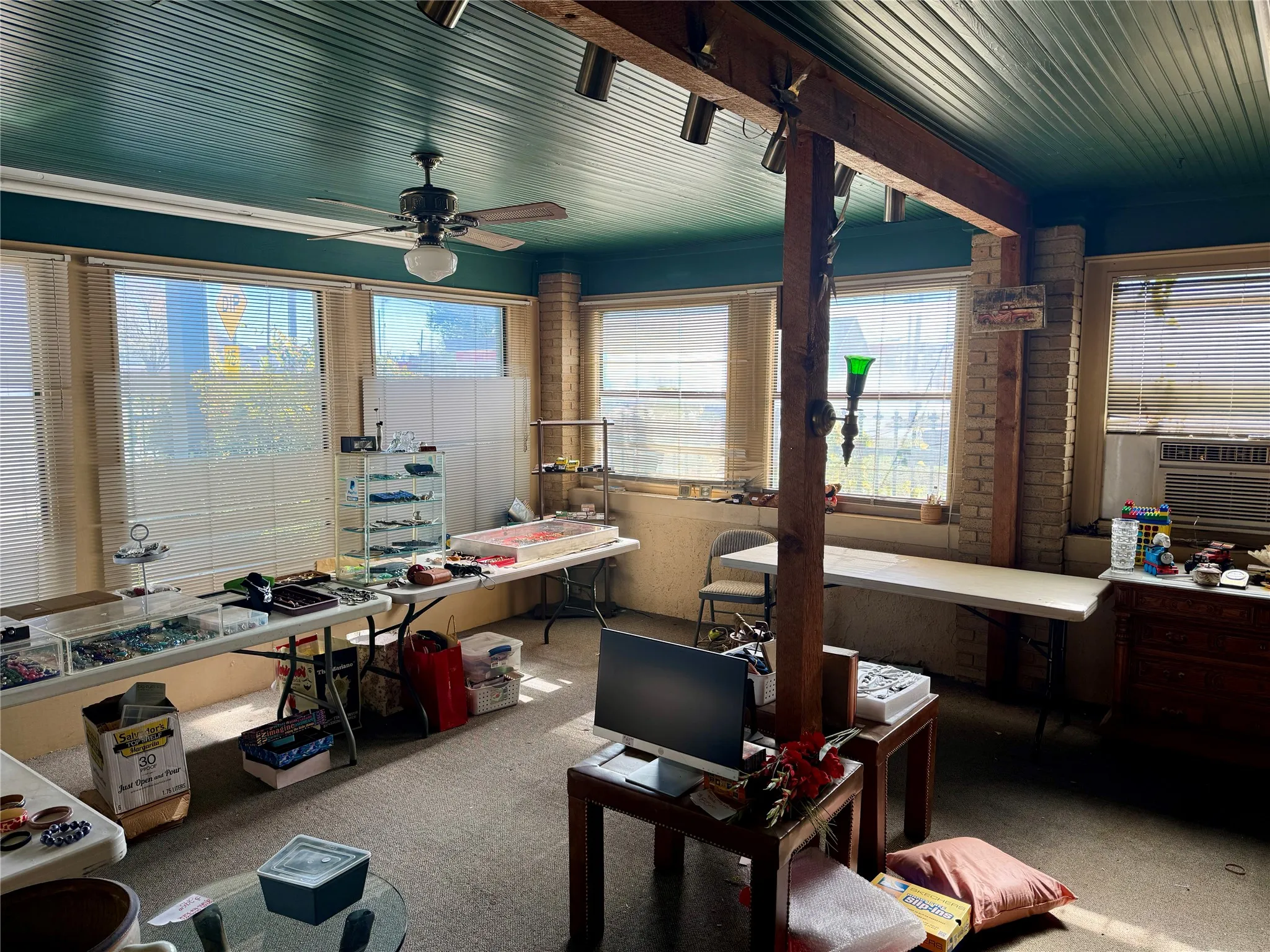 Office area with carpet and cooling unit