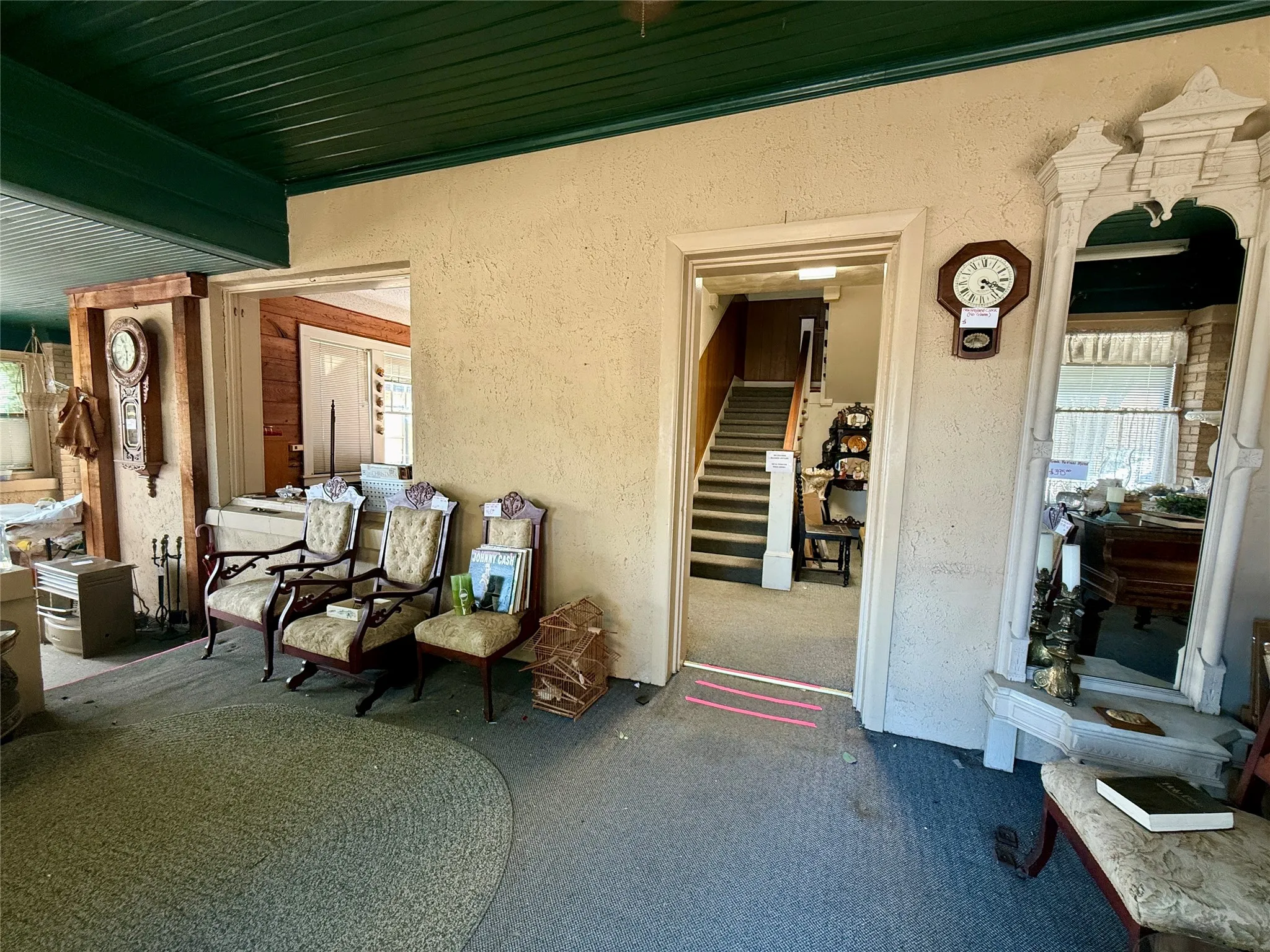 Property entrance featuring stucco siding
