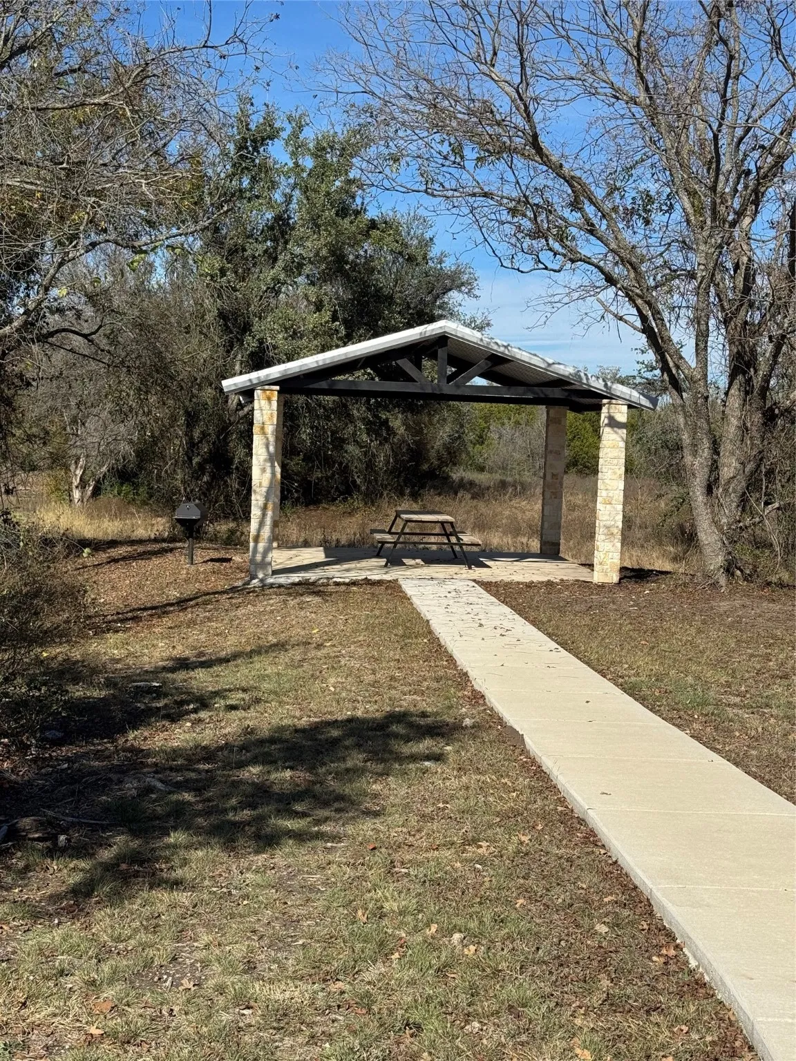 View of home's community featuring a patio and a yard