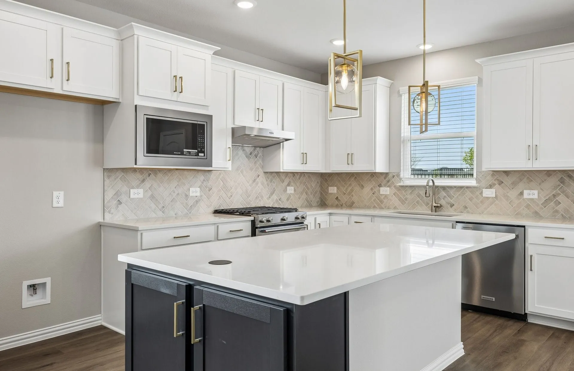 Beautiful kitchen with pendent lighting