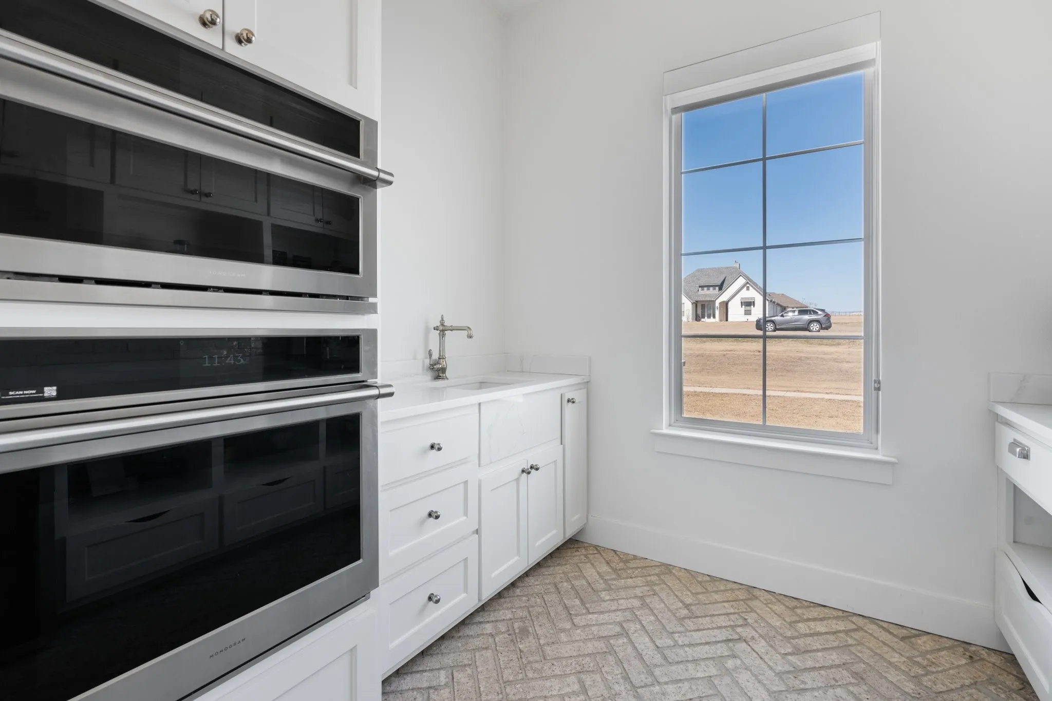 Bulters Pantry with 5-in-1 Oven with Advantium Technology, Advanced Oven, & Convenient Water Faucet