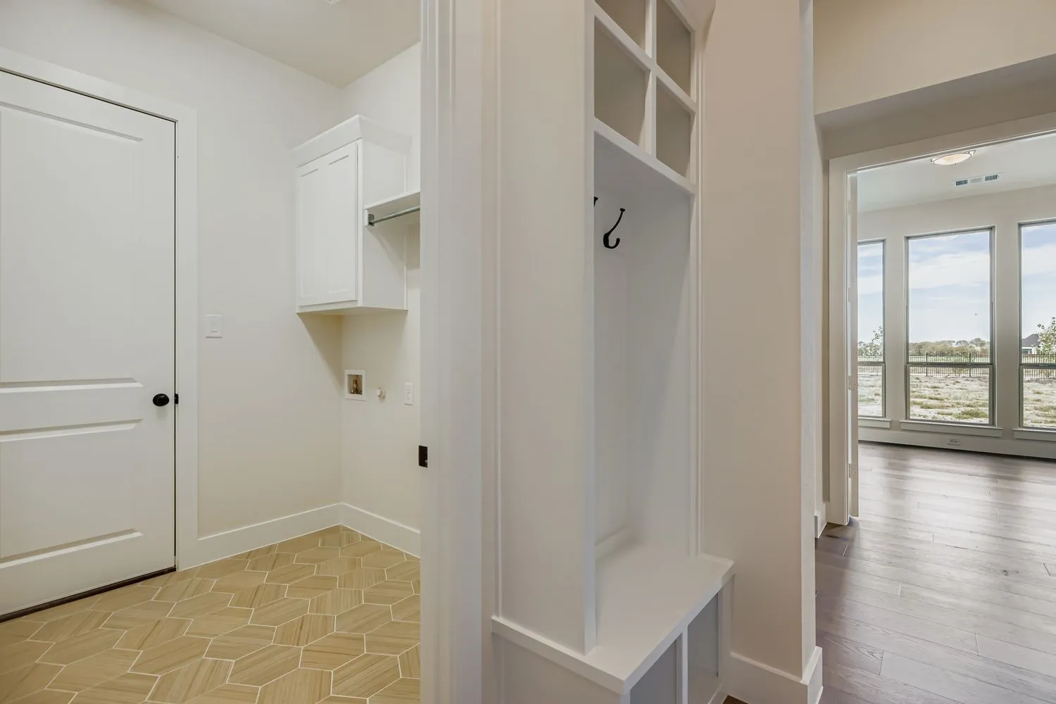 Mudroom featuring baseboards